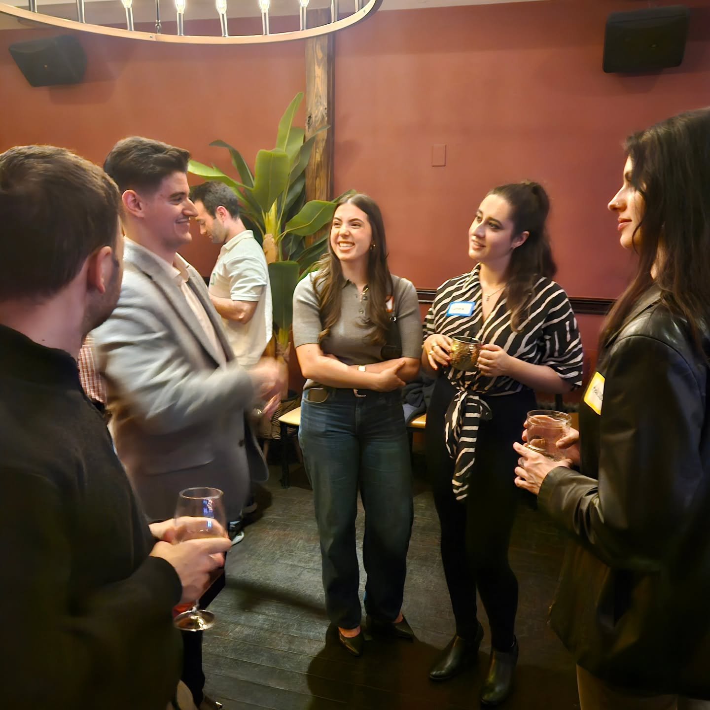 Guests in conversation at a neighborhood social