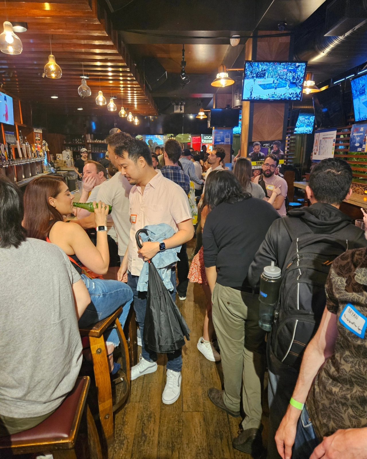 A full room of neighbors at a monthly social